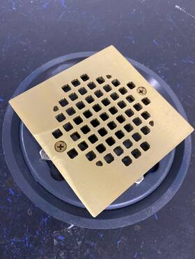 D50135 Jones Stephens Pvc Shower/floor Drain With Polished Brass Strainer