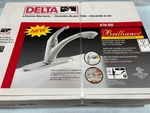Delta 470-SS Signature Pull-out Spray-lever Handle Kitchen Faucet, Stainless. Fixed Price $499.00.