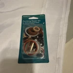 Plumbing Kit, 45 Assorted Items For Home Repair, Peerless# 067X. Fixed Price $6.00.