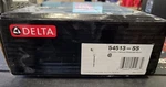 Delta 54513SS 3-FUNCTION Hand Shower W/ Hose & Wall Mount Brilliance Stainless. Fixed Price $111.99.