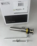 Delta RP38958CZ Pop-up Drain Assembly 50/50 Champagne Bronze New. Fixed Price $51.00.
