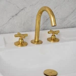 Osaka Widespread Bathroom Faucet With Cross Handles Unlacquered Brass. Fixed Price $345.55.