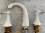 Kohler 310-4-PW Finial Widespread Lav Faucet Pol Brass/white High Arch Spout. Fixed Price $575.00.
