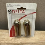 Delta Metal Lever Handle Accent Set In Polished Brass Model#: A64PB. Fixed Price $49.99.
