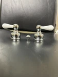 Delta Metal Lever Handle Set - 2H Bathroom In Chrome / White Model#: H25CW. Fixed Price $30.00.