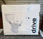 New Drive Raised Locking Toilet Seat Model RTL12026. Fixed Price $45.00.