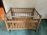 Vintage Port-a-crib With Fold-down Side And Casters 40 X 27 29. Fixed Price $83.00.