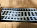 6 Nds 2 Ft. Plastic Spee-d Channel Drain Grate Gray. Fixed Price $50.00.
