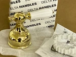 Delta H712PB Polished Brass Lever Faucet Handle W/ Porcelain Accent Nos. Fixed Price $62.00.