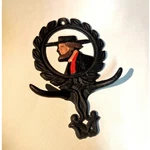 1122. Vintage Cast Iron Wall Hanging With Hooks. Fixed Price $12.00.