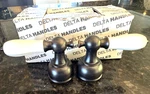 Delta H212RB Oem Victorin Venetian Bronze & Porcelain White Lever Handles - New. Fixed Price $64.00.