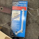 Keeney Mfg. 645 Pvc Cable Drive 1-1/2" Bath Drain New Unopened Box. Fixed Price $29.00.