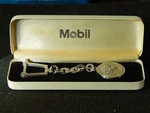 Mobil Oil Silver Tone Key Chain - Pegasus Medallion White Presentation Box. Fixed Price $50.00.