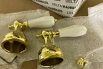 Delta H212PB Faucet Handles Brass & Porcelain Levers Screws. Fixed Price $68.00.